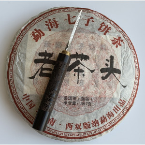 Шу пуэр Старая чайная голова 2006 года блин 357 г. Photo 3